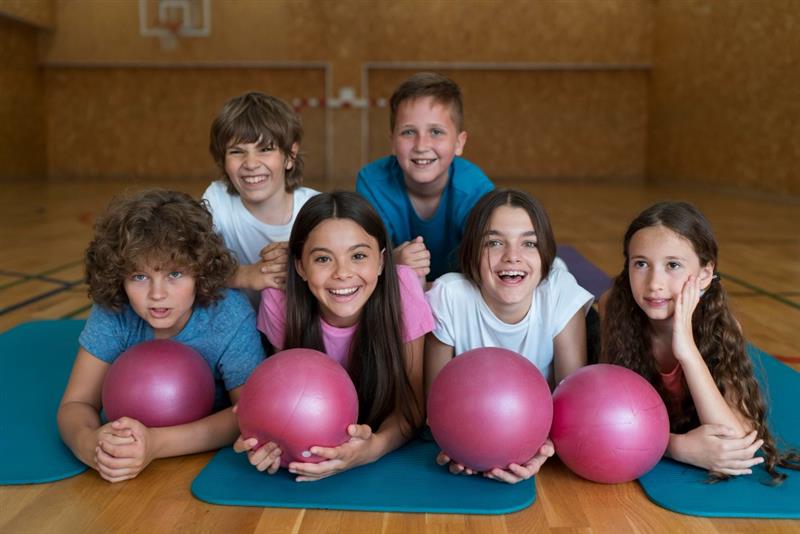 Students participating in juniors wellness programs designed to improve fitness levels through structured physical training activities.